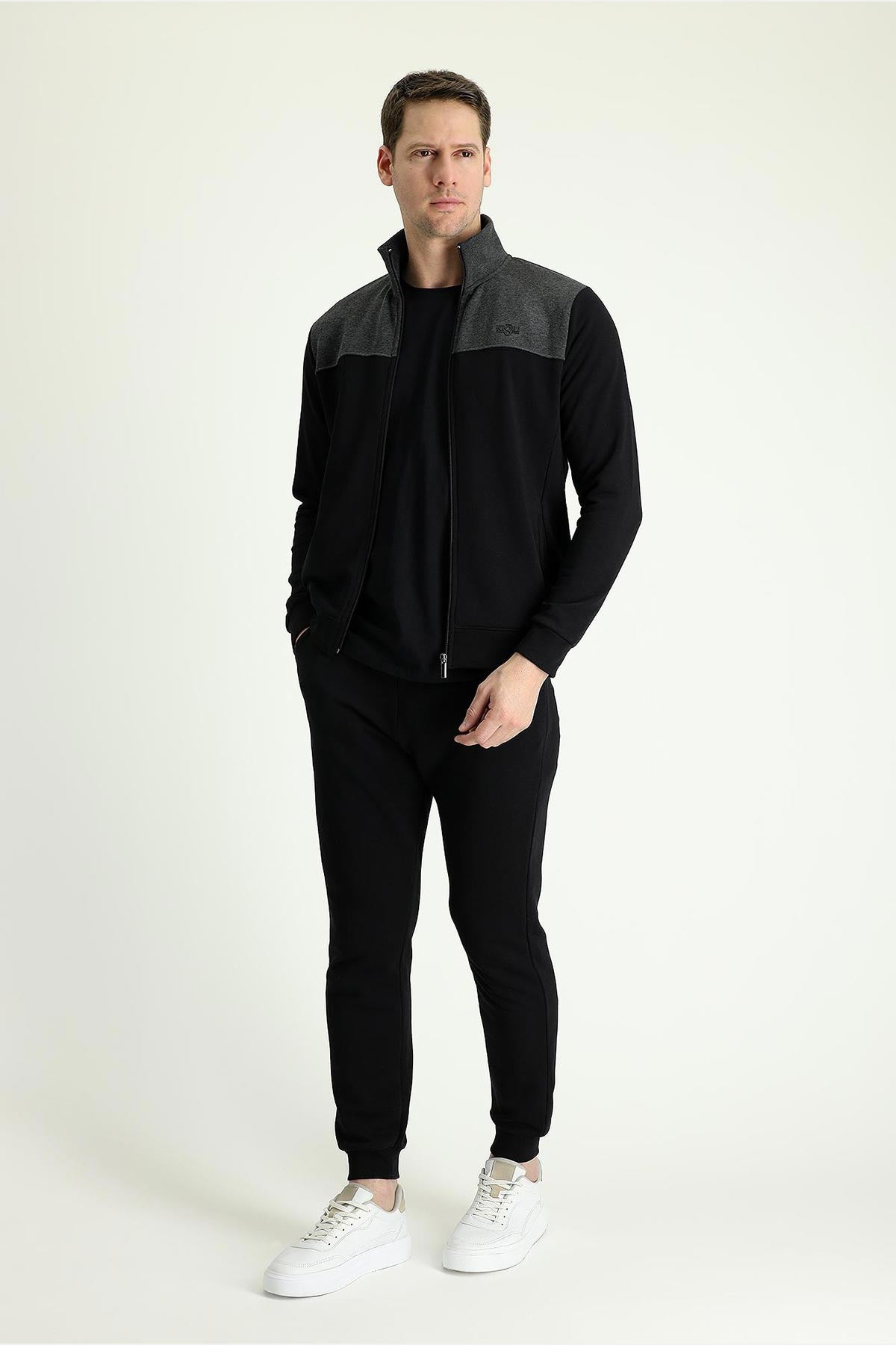 Kiğılı fermuarlı paçalı eşofman takımı tam görünüm - sportif ve şık