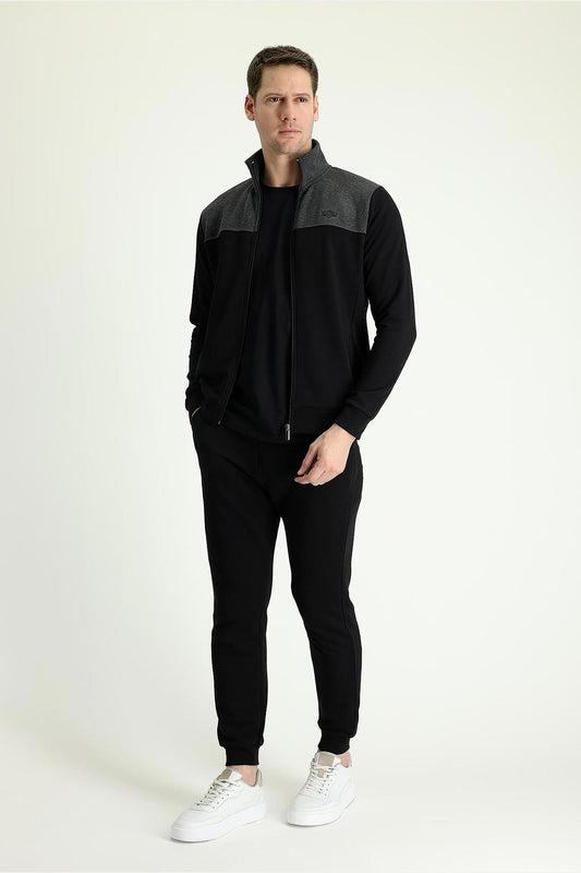 Kiğılı fermuarlı paçalı eşofman takımı tam görünüm - sportif ve şık